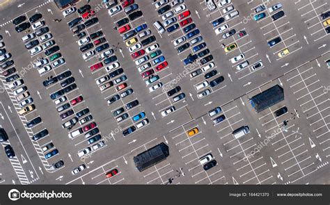 Aerial Top View Of Parking Lot With Many Cars From Above