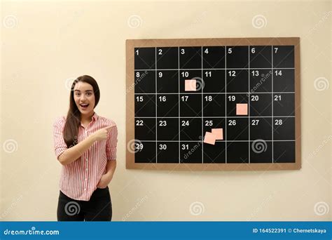 Young Beautiful Woman Near Board Calendar Stock Image Image Of