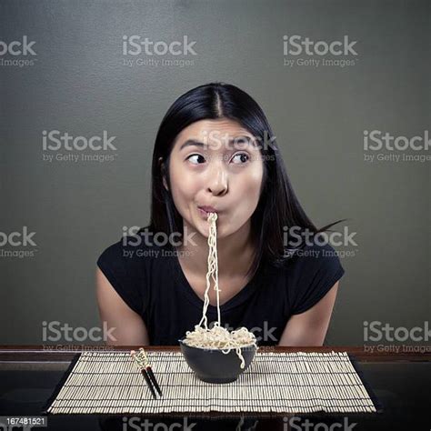Chinese Girl Eating Ramen Noodles Stock Photo Download Image Now