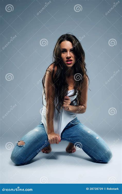 Beautiful Woman Kneeling On The Floor Stock Image Image Of Blue