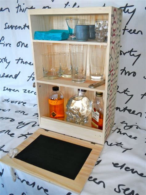 Ikea's besta cabinet with a cane door. A great wall mounted liquor cabinet or countertop mini bar ...
