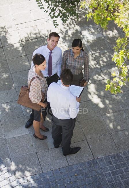 Business People Talking Outdoors — High Angle View Business Meeting
