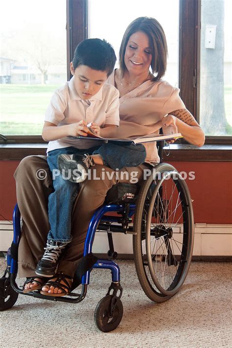 Pushliving Disability Stock Images Young Mother In A Wheelchair Reading