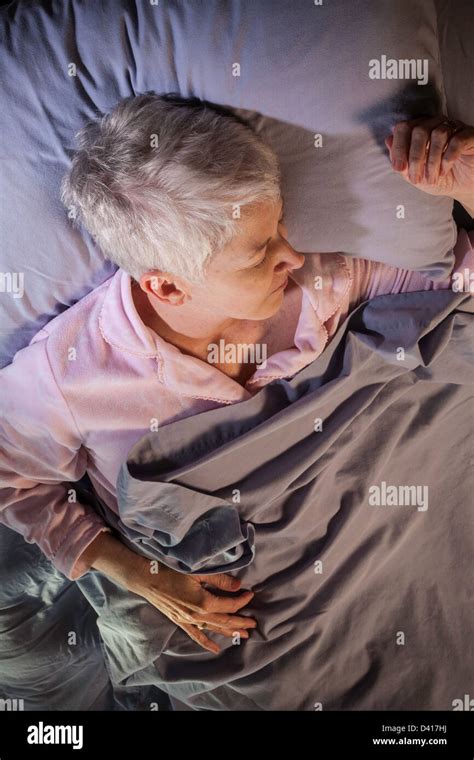 Mature Woman Sleeping Stock Photo Alamy