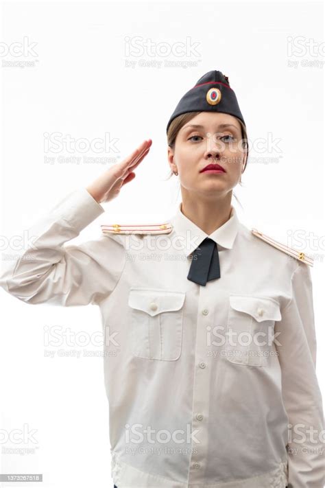 A Beautiful Young Female Russian Police Officer In Dress Uniform And A