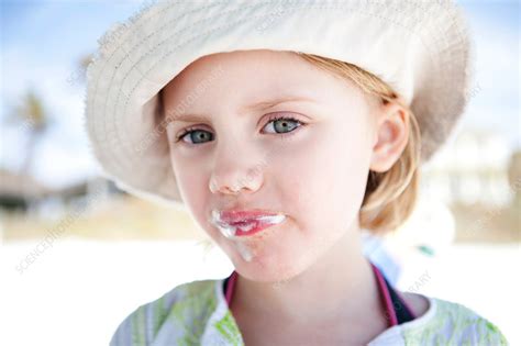 Little Girl With Ice Cream Around Her Mouth Stock Image F0191166