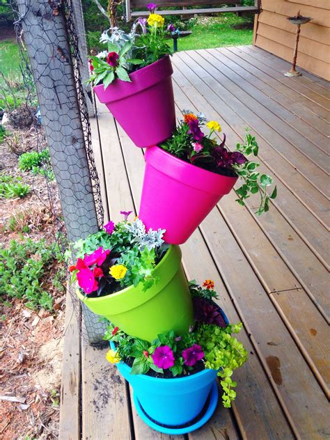 this was so easy and such a cute idea garden pots flower pots outdoor stacked flower pots