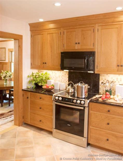 Let all the furniture have a natural texture so that it gives a distinctive cherry wood ruffled touch and a thick rustic impression. Pictures of Kitchens - Traditional - Light Wood Kitchen ...