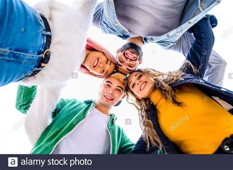 Happy Young Multiracial People Meeting Outdoors Group Of Cheerful