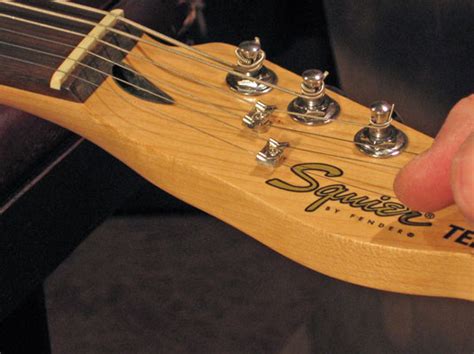 It's reversible, it's not too hard, and it has an guitar wiring, the golden rule. How to Restring an Electric Guitar that Has String Retainers - dummies