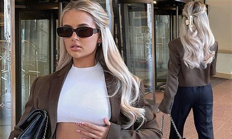 Molly Mae Hague Puts On A Stylish Display In Ab Baring White Crop Top And Brown Jacket Daily