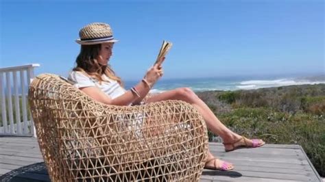 Woman Sitting Wicker Chair Map — Stock Video © Imagesource 214952942