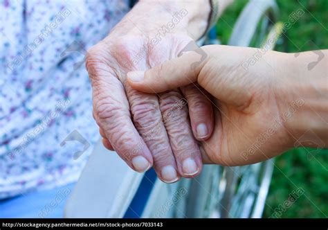 Caregiver Holding Seniors Hand Royalty Free Image 7033143