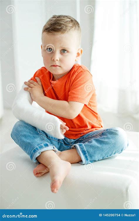 Little Boy With A Broken Arm Stock Photo Image Of Communication