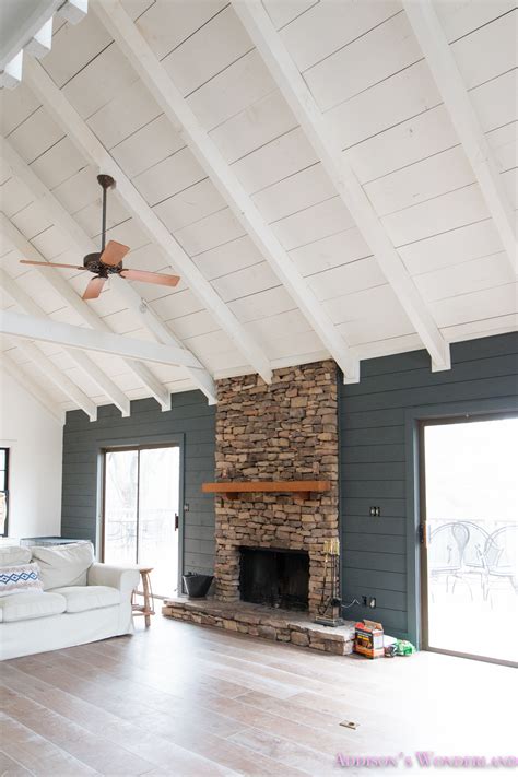 Pine Ceilings Painted White Trimming The Ends Of A Plank Wall In