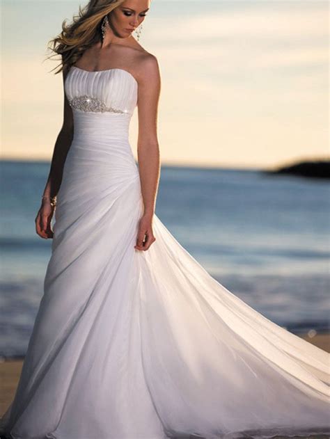 Along with these beautiful white dresses, some accessories may also go along with the gown such as flower pins and some simple small pieces of. 25 Beautiful Beach Wedding Dresses - The WoW Style