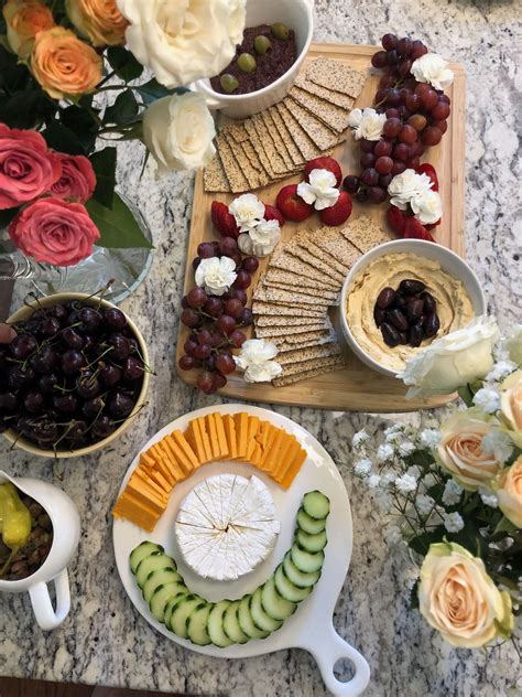 Simple to prepare and easy to eat, finger foods are a fun and portable way for your guests to nosh while they mingle. Healthy finger food platter served at family graduation. #appetizer #starterspread # ...