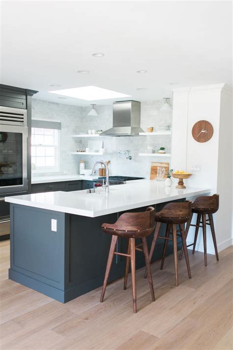 Stylish Eat In Kitchen With Rounded Wood Barstools Hgtv