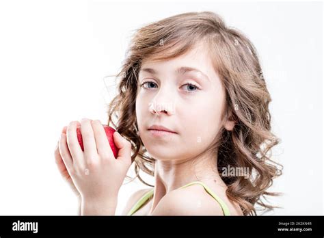 Girl About To Bite A Red Apple On White Background Stock Photo Alamy