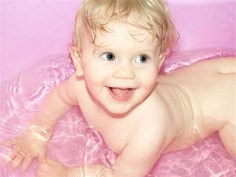 Baby Girl Bathing In The Bath Stock Photo By Denoiser
