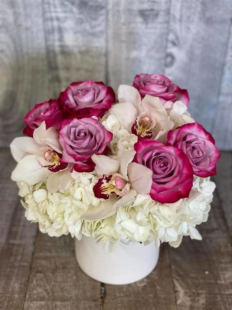 Lavender Roses With Hydrangea And Orchids By Dianas Flowers
