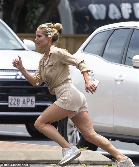 Elsa Pataky Shows Off Her Toned Legs In A Pair Of Tiny Shorts As She Makes A Mad Dash In Byron