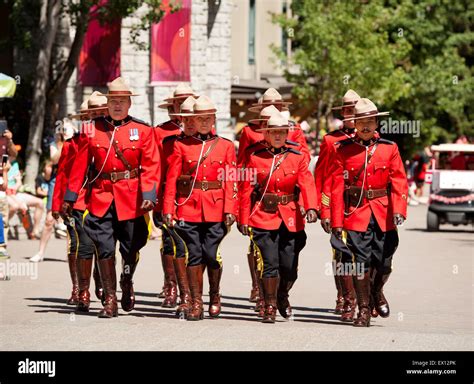 Royal Canadian Mounted Police Officers Parade In Ceremonial Red Serge