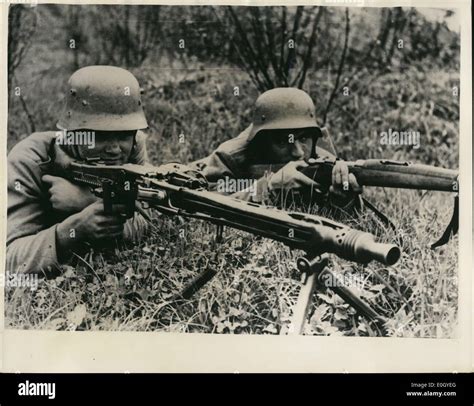 Jan 01 1940 German Soldiers With A Mg42 Machine Gun Left And The