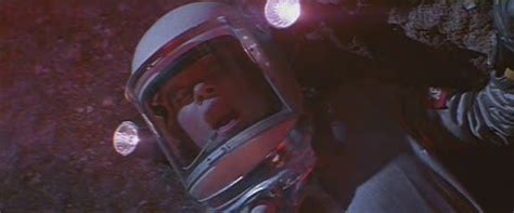 Sandy Judy Geeson Having Had Her Air Hose Ripped From Her Spacesuit