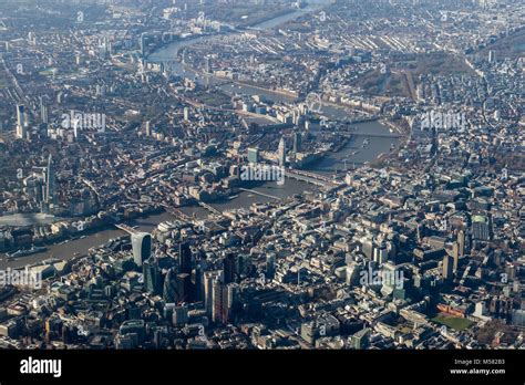 Aerial View Of Central London Looking West Along The Thames From The