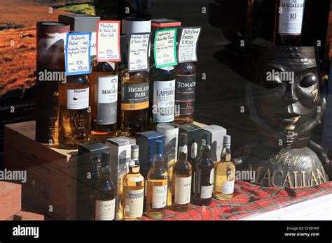 Bottles Of Scottish Malt Whisky In A Window Display For Sale In A Shop