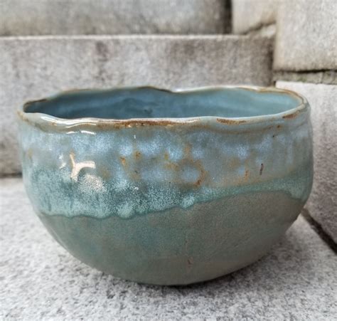 Browse a variety of modern furniture, housewares and decor. Layered blue glossy and matte finished ceramic bowl ...