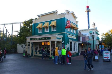 Information and photos of the flags funnel cakes dining location at six flags over texas. #America #Cakes #Flags #Funnel #Fuzzygears #Great # ...