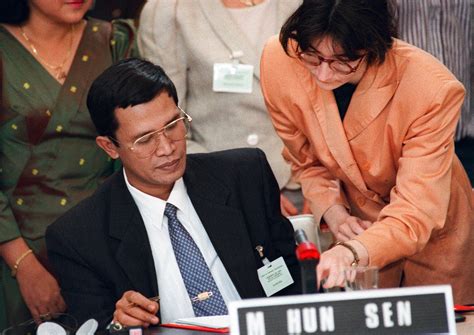 Dancing Among The Wolves Hun Sen Prime Minister Of Cambodia Signing The Peace Treaty That