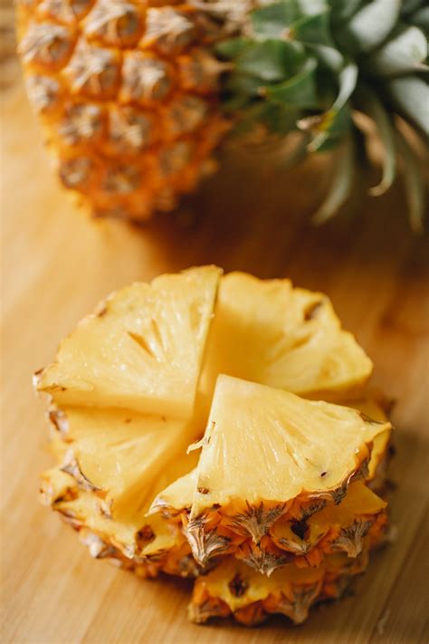Fresh Cut Pineapple On Table · Free Stock Photo