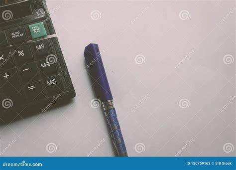 Pen And Calculator Financial Accounting Work And Business Concept