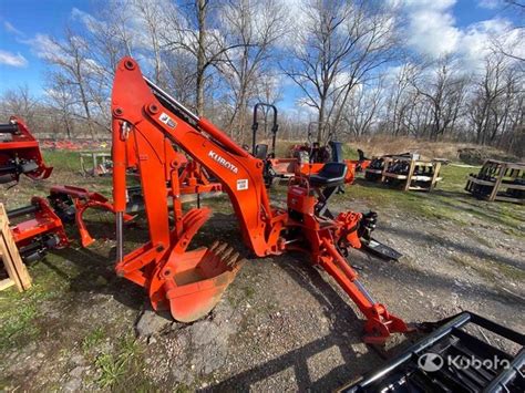 Kubota Bh92 Backhoe Attachment And 1 Land Pride Sgc1060 Grapple Land