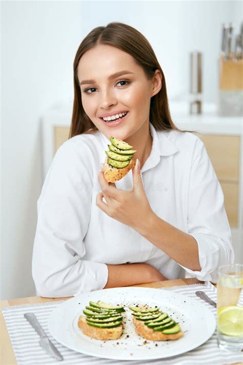 Healthy Nutrition Beautiful Young Woman Eating Nuts Stock Image