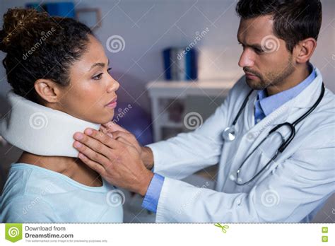 Physiotherapist Examining A Female Patients Neck Stock Photo Image Of
