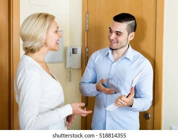 Happy Mature Woman Answers Questions Adult Stock Photo