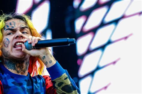 6ix9ine reportedly signs 10m record deal from prison