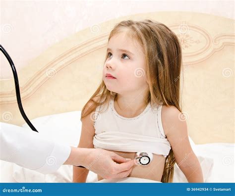Little Girl And The Doctor For A Checkup Examined Stock Photo Image