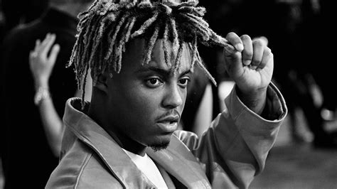 Black And White Photo Of Juice Wrld Holding Hair With Hand