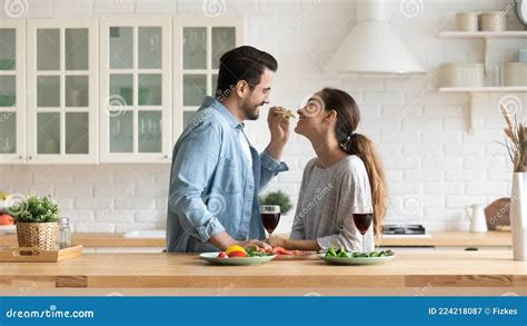 Caring Husband Feed His Beloved Wife In Kitchen Celebrate Event Stock Image Image Of Feed