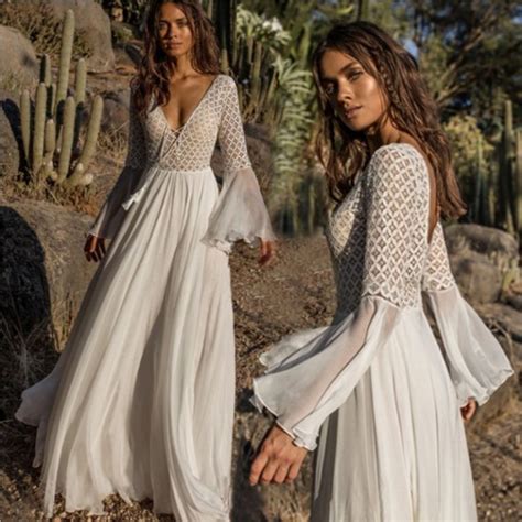 european and american lace hollow horn sleeve bohemian white beach dress loose seaside sexy