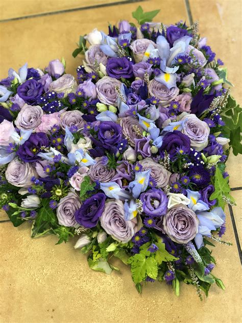 Send funeral flowers wherever they need to go. Purple Heart tribute | Tropical floral arrangements ...