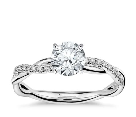 From geometric settings to floral etchings, these unusual wedding bands are perfect this ring incorporates white and silver diamonds around the band for a bit of sparkle. Petite Twist Diamond Engagement Ring in Platinum (1/10 ct ...