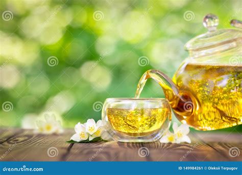 Teapot And Cup Of Jasmine Tea Stock Image Image Of Twig Teacup