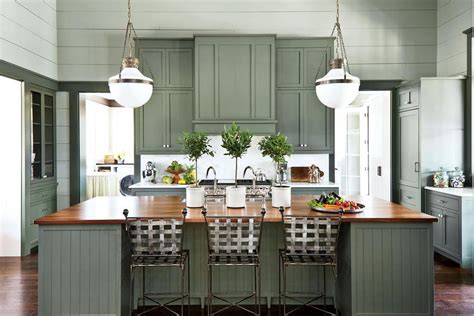 We love the wooden texture and sage green that turn this kitchen a lively place! 15 Ways with Shiplap | Southern living homes, Green ...