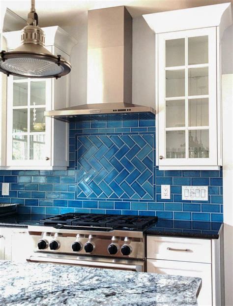 This stunning mosaic backsplash is made entirely of mixed tiles. Ocean-Inspired Tile Backsplash | Calm, cool, and colorful ...